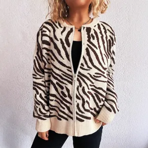 Detailed view of women's brown zebra pattern zip-up knit cardigan sweater stylish outerwear.