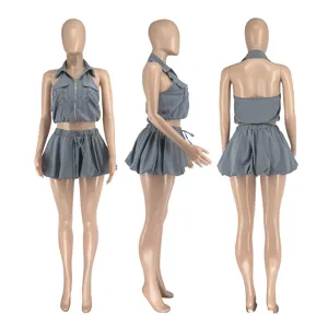 Grey two-piece halter crop top and bubble skirt set detail view showcasing back and side.
