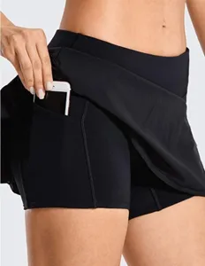Vue detaille short jupe de sport femme taille haute yoga avec poche laterale plisee.
