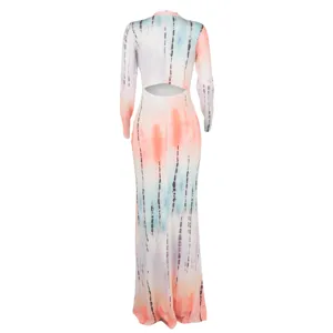 Back view detail of women long sleeve tie dye maxi dress showing backless cutout design.
