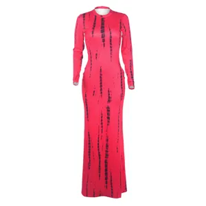 Close-up of long sleeve tie-dye maxi dress, showing slim fit and abstract stripe details.