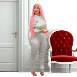 Women's stylish cable knit two-piece set, long sleeve top and high waist trousers in grey.