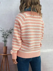 Detail view of women's striped knit sweater with denim lapel fake two-piece design in pink white.