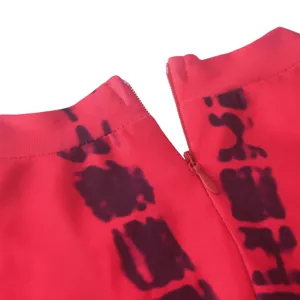 Red slim tie-dye dress detail view with hidden zipper, autumn fashion style for women