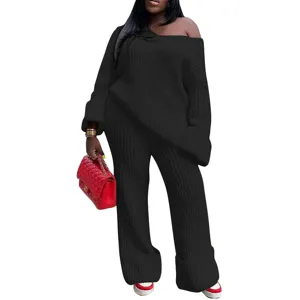 Black off-shoulder knit two piece set detail view, featuring loose top and wide-leg pants.
