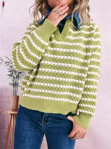 Close-up detail of women's autumn striped sweater with denim lapel and long sleeves.