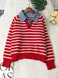 Close-up detail of red white striped knit sweater featuring blue denim fake two-piece lapel collar.
