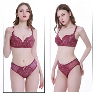 Details zum weinroten gepunkteten Spitzen Push-up BH und Slip Set für bequemen Damenlook.