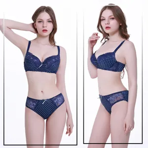 Dunkelblauer gepunkteter Spitzen-Push-up-BH- und Slip-Set, Vorder- und Seitenansicht Detail.