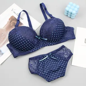 Blauer Pünktchen Spitzen BH und Slip Set, sexy Unterwäsche mit süßer Schleife und pass.