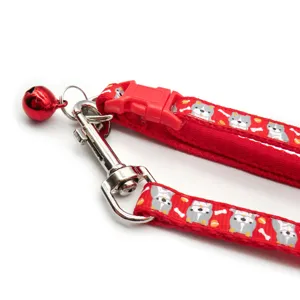 Red pet collar leash set with cute cartoon dog pattern, metal clasp and bell for pets.