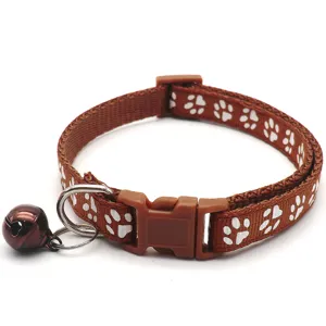 Brown paw print pet collar with bell and buckle, 1.0cm width cat and dog accessory detail.