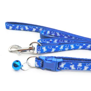Blue dog leash and collar set with cute bone pattern, durable pet walking accessories.
