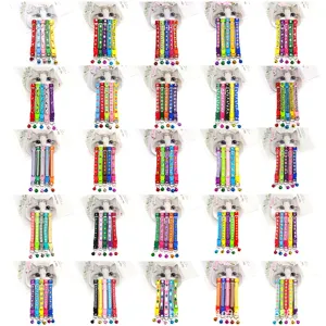 Detailed view of colorful fabric pet cat collars featuring cute prints, bells, and varied styles.