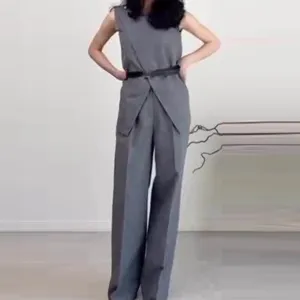 Elegant grey sleeveless top paired with a high waist wide leg pants two piece set.