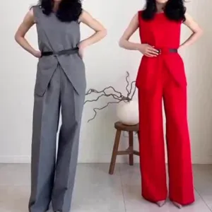 Women's sleeveless top and high waist wide leg pants detail view in grey and red.