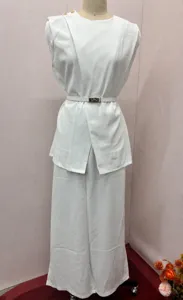 Detailed showcase of the stylish white sleeveless top and wide-leg pants two-piece set.