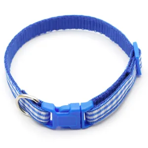 Blue plaid pet collar strap with plastic safety buckle and metal D-ring detail view