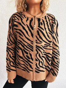Detailed view of women long sleeve zebra pattern knitted cardigan with zipper closure.
