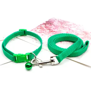 Green pet collar and leash set with bell, adjustable nylon strap for small dogs and cats.