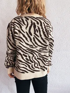 Back view detail of women brown zebra print knit cardigan sweater, long sleeves, chic.