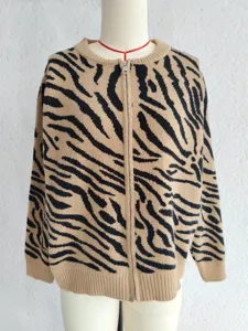 Detail shot of the stylish zebra pattern knitted cardigan sweater with front zip closure for women.