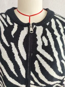 Black and white zebra print knit cardigan sweater with zipper collar for women daily.