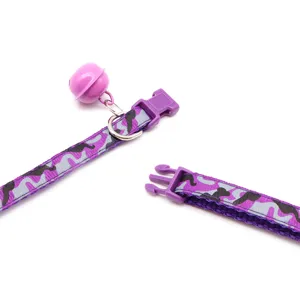 Purple camouflage pet collar detail close-up, featuring adjustable buckle and cute bell.