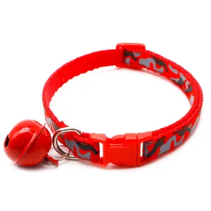Red camouflage cat collar detail, featuring nylon strap, quick-release buckle, and red bell.