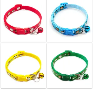 Detailed view of 1cm colorful pet collars featuring cute cartoon prints, safety buckles, and bells.
