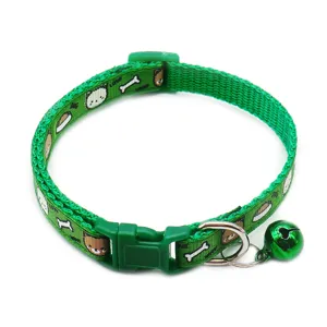 Green nylon pet collar featuring cute cartoon bear and bone print with a small bell.