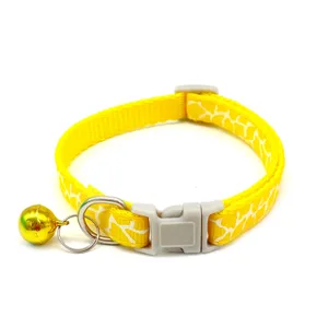 Yellow pet collar with white cracked pattern, metal bell, and buckle for cats and dogs.
