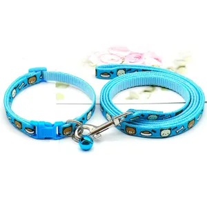 Blue pet dog leash and collar set with cute cartoon pattern and bell for small pets.