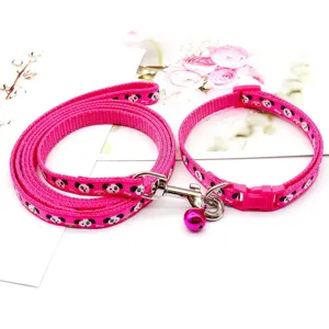Pink pet leash and collar set with cute cartoon print and bell, adjustable daily walking.
