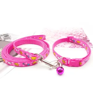 Pink cartoon print pet leash and collar set with cute bell for small dogs and cats.
