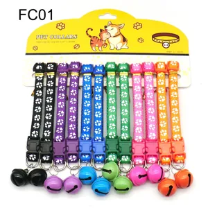Colorful pet collar set with cute paw print patterns and clear ringing bells, 12 pieces per card.