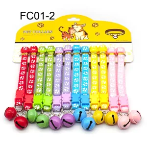 Colorful pet collar set with paw prints, plastic buckle, and bells, detail display card.