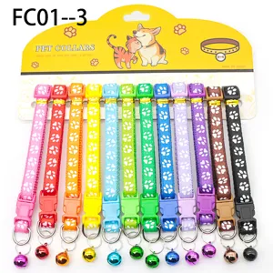 Colorful pet collar set with paw print pattern and bell, nylon fabric cat dog collar accessories.