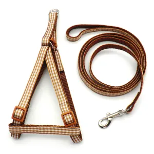 Brown plaid dog harness and leash set, vest style pet walking accessories for dogs and cats.