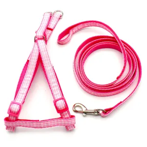 Pink plaid pet dog harness and leash set, comfortable vest style for walking cats and dogs.