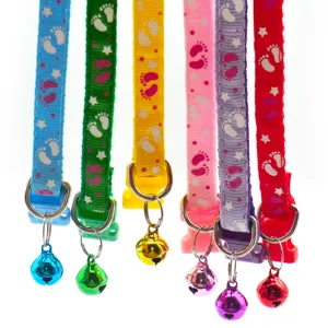 Colorful pet collars with foot and star prints, featuring cute bells for cats and dogs.