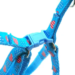 Blue pet harness strap with cute heart pattern and sturdy plastic buckle for daily dog walking.