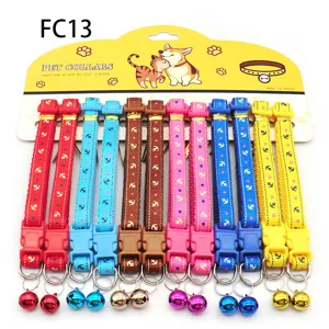 Colorful printed pet collar with bells, adjustable fabric cat and dog necklace accessory detail.