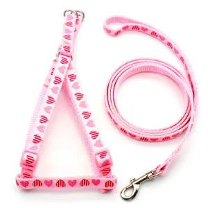 Pink cute heart pattern pet harness and leash set for dogs cats. Detailed product display.