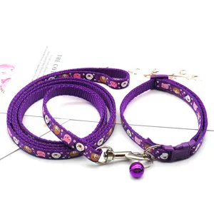 Close-up details of the purple pet leash and collar set featuring cute bear prints and bell.
