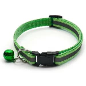 Green reflective pet collar detail view, 1cm width with secure plastic buckle and bell.