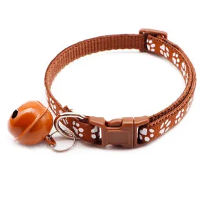 Brown pet collar with cute white paw prints, adjustable buckle, and a loud bell for pets.