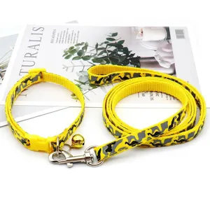 Yellow camo pet collar and leash set with metal clasp and bell for cats and dogs daily walking.