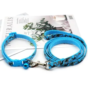 Blue camouflage pet collar and leash set detail showing adjustable buckle and metal clasp.