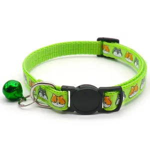 Green printed pet collar with cute cartoon dog face, bell, and secure buckle for cats dogs.